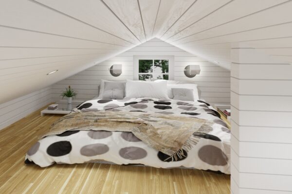 En säng på ett loft med träfärgat golv